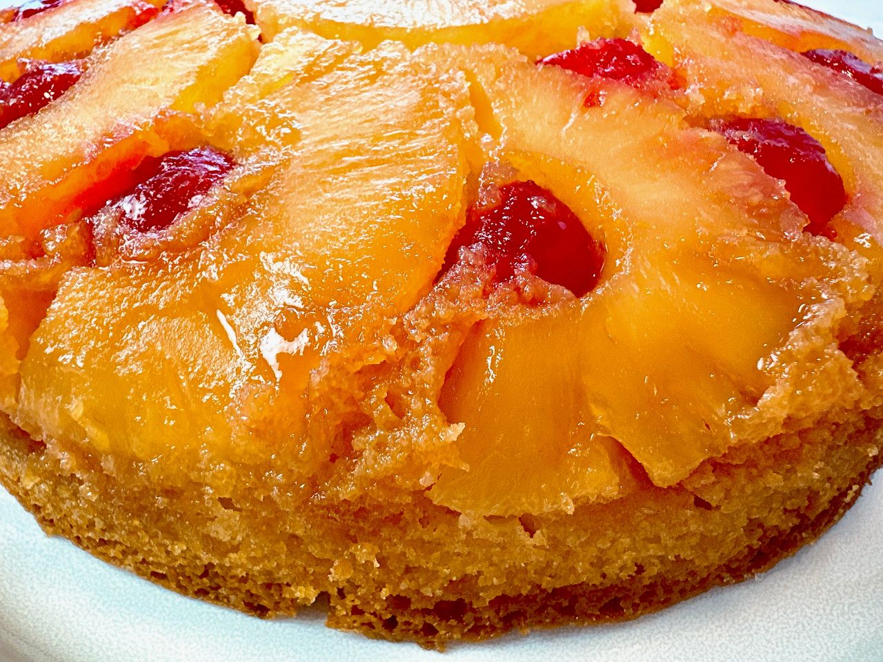 pineapple upside cake on a white plate