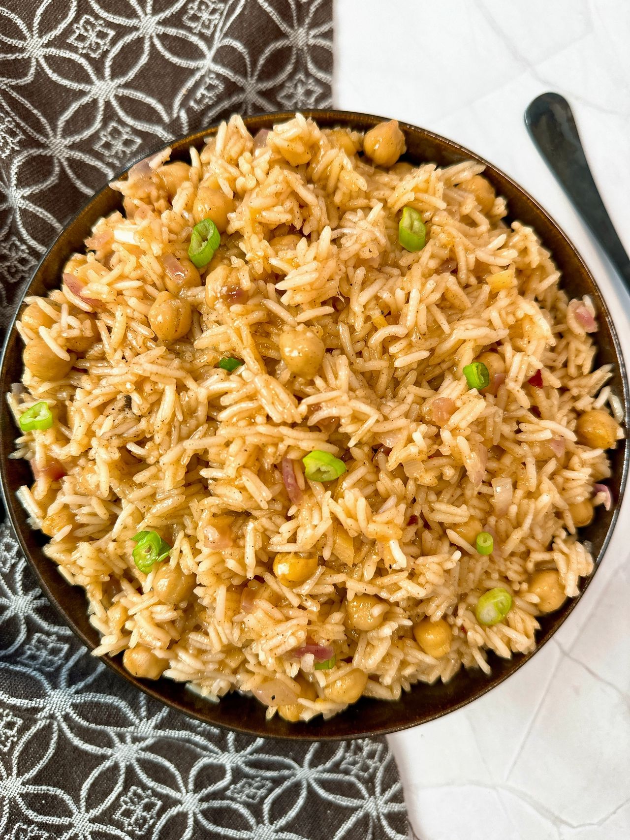 mango rice in a brown bowl