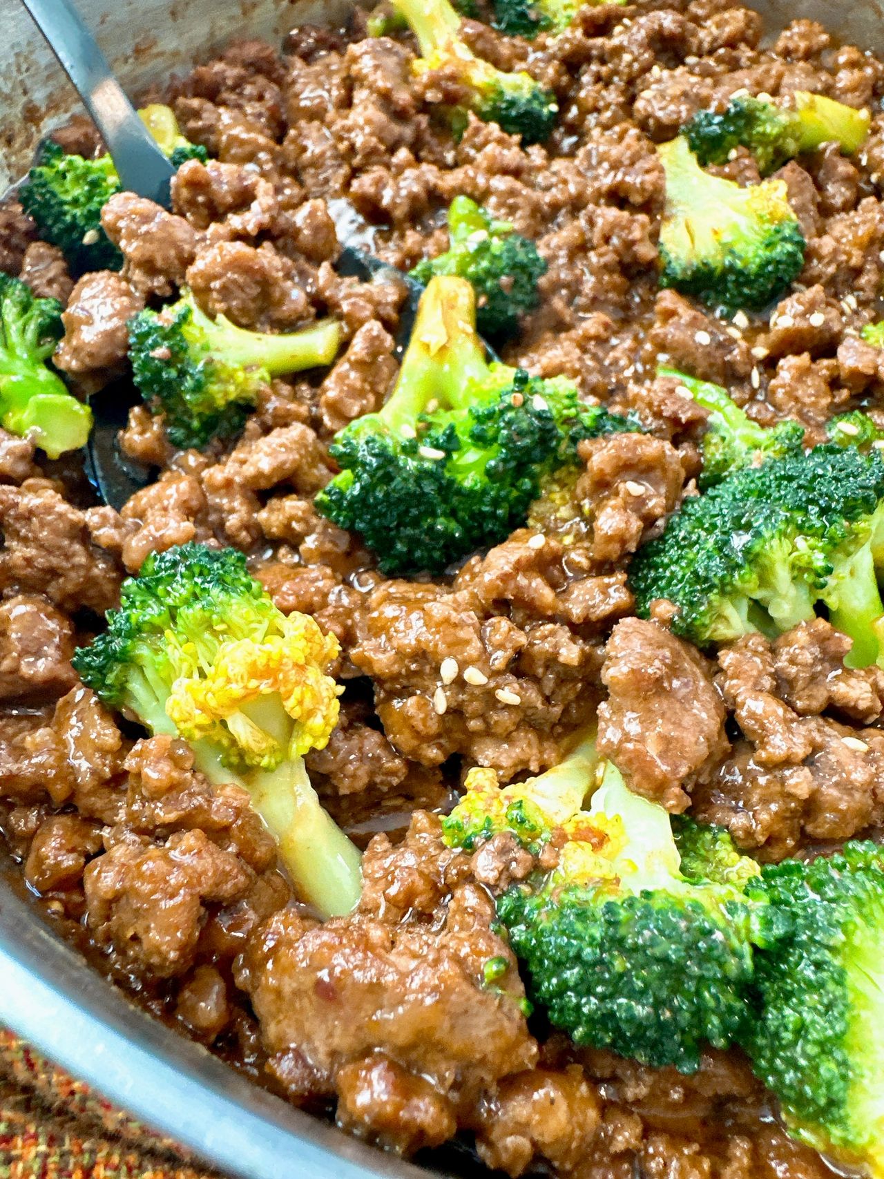beef and broccoli in a skillet
