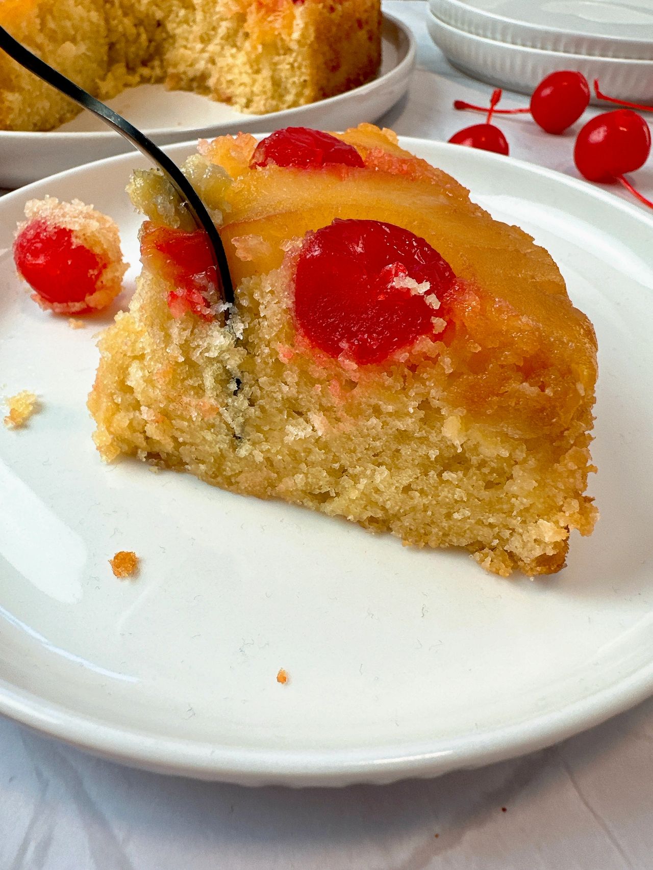 pineapple upside cake on a white plate