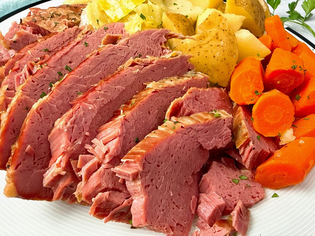 Corned Beef and Cabbage on a white serving platter