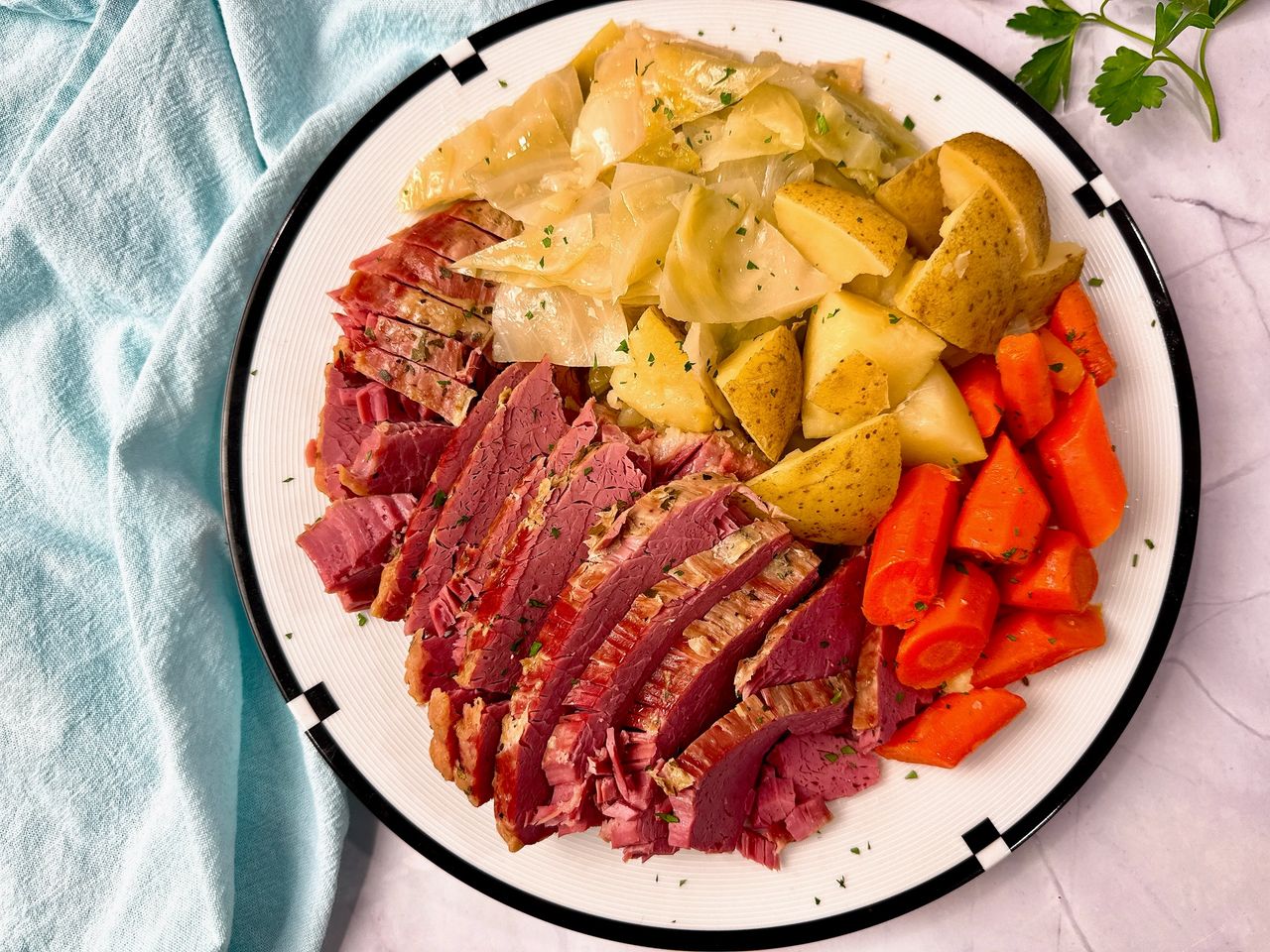 Corned Beef and Cabbage on a white serving platter