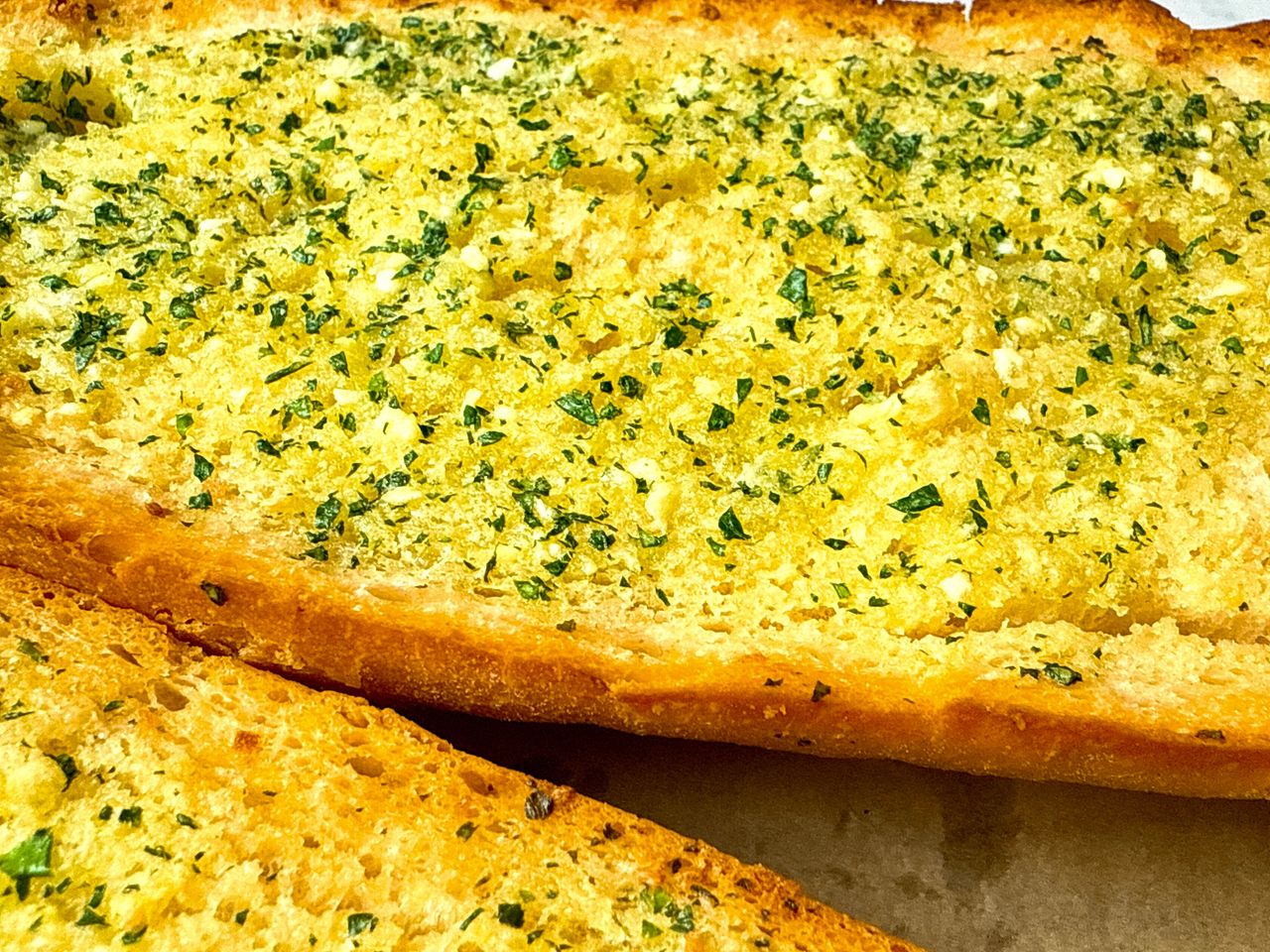 garlic bread on parchment paper