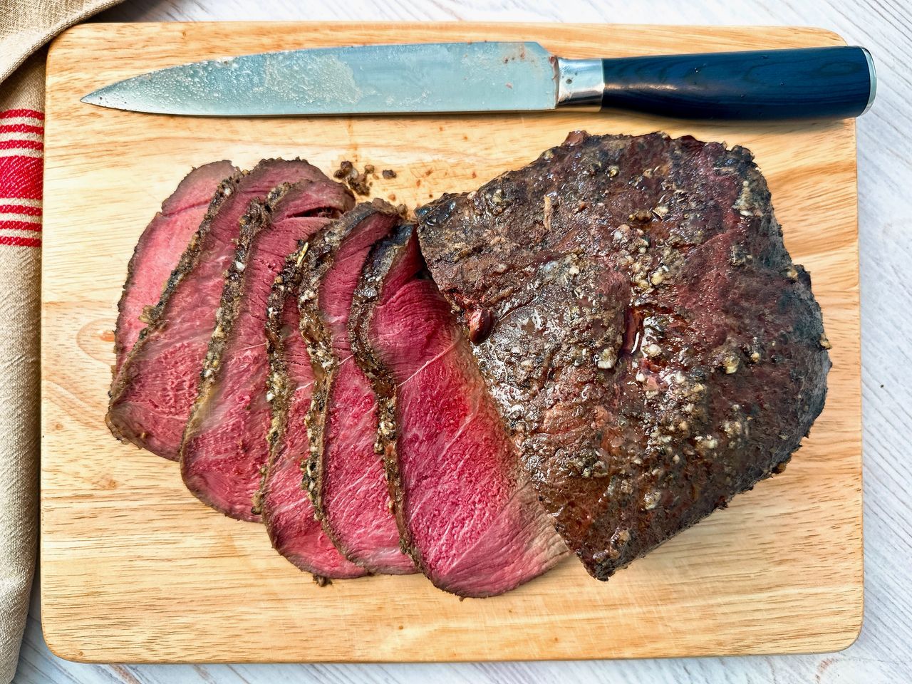 sirloin tip roast on a cutting board