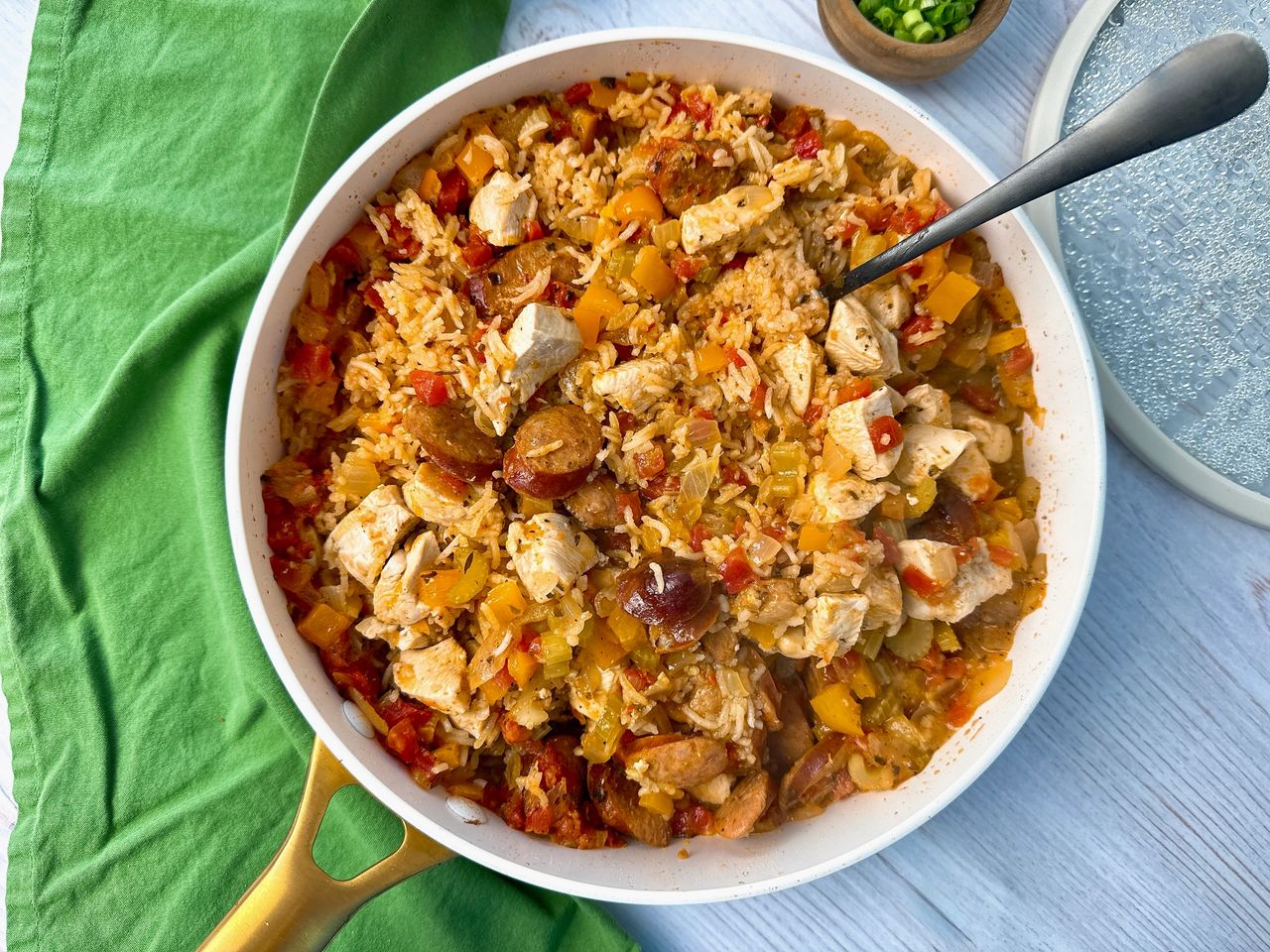 jambalaya in a white sauce pan