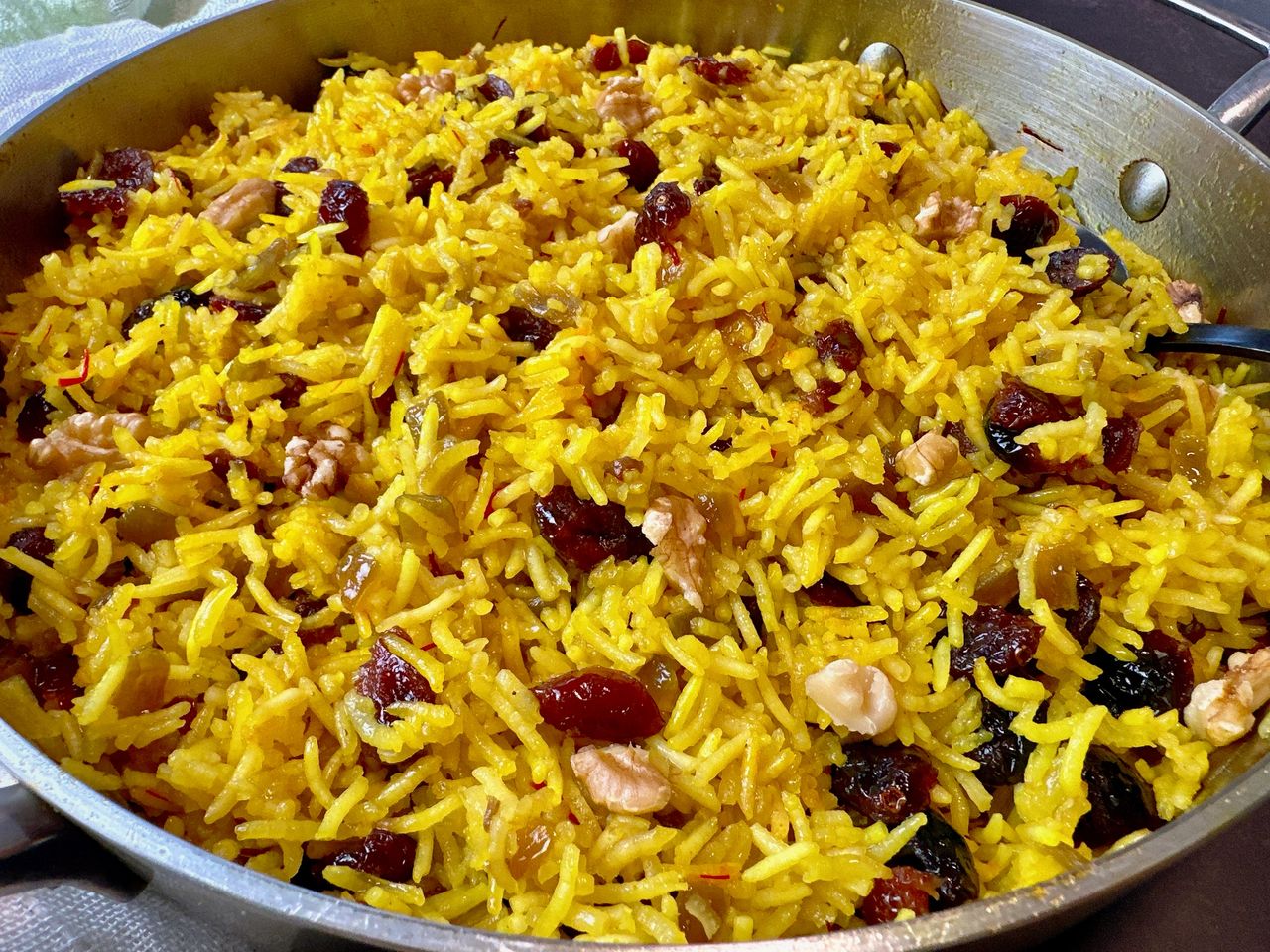 rice pilaf with cranberries in a skillet