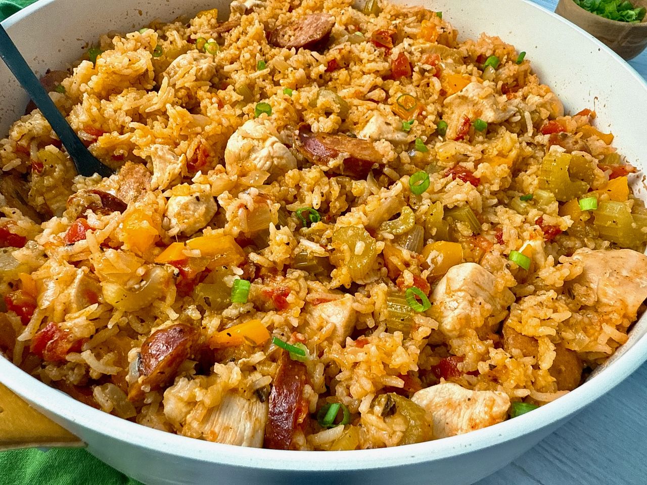 jambalaya in a white sauce pan
