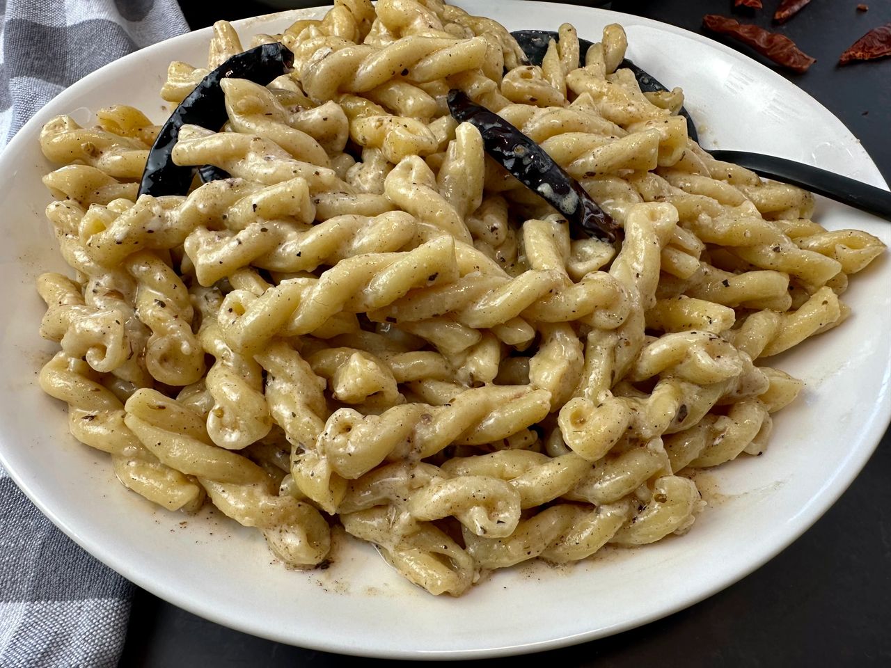 pasta with cream sauce and dried chilies