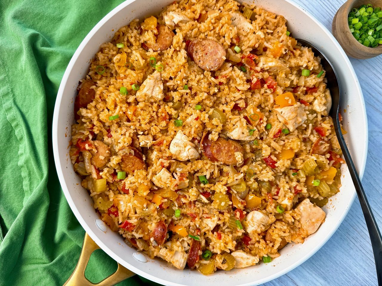 jambalaya in a white sauce pan