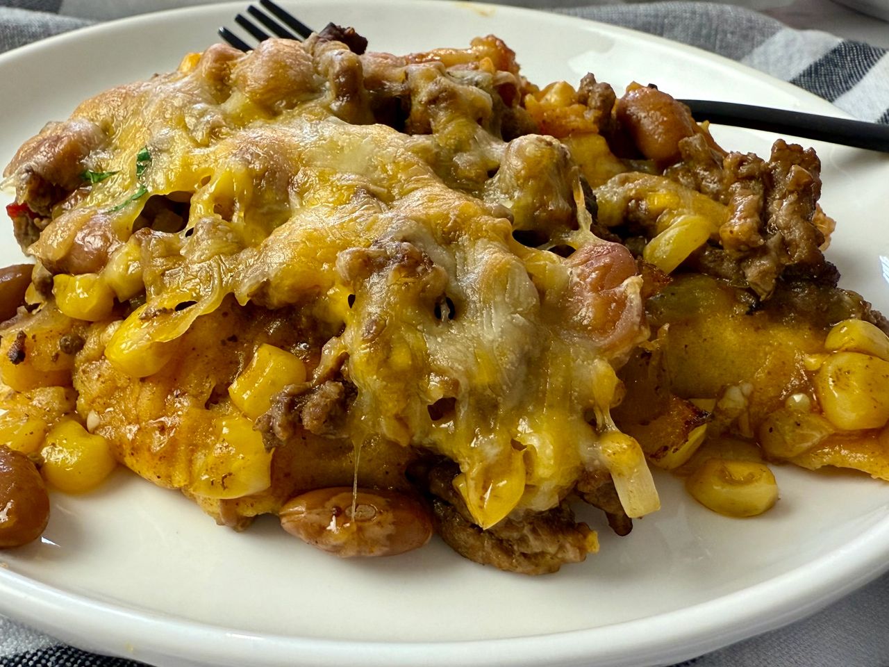 enchilada casserole on a white plate