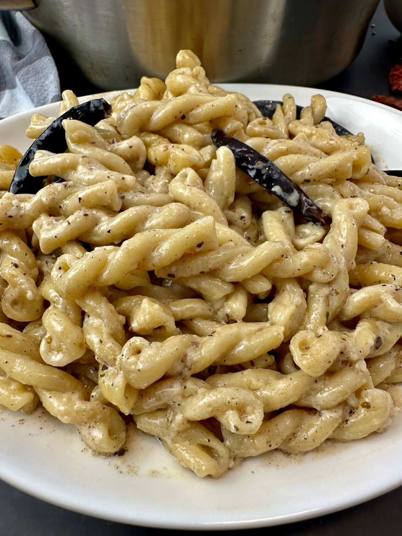 pasta with cream sauce and dried chilies