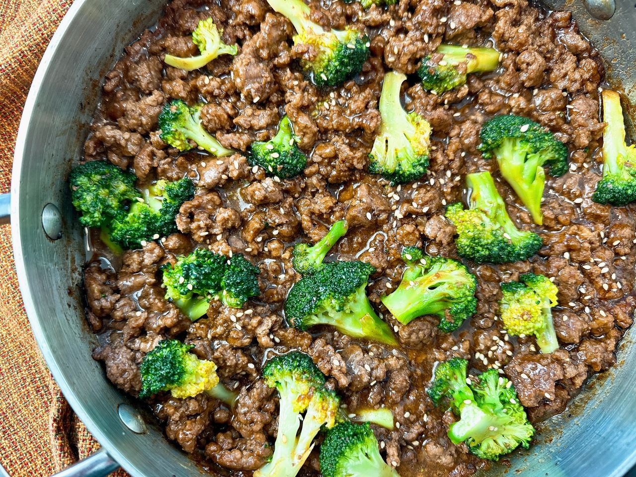 beef and broccoli in a skillet