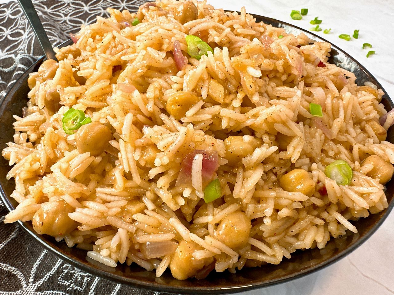 mango rice in a brown bowl