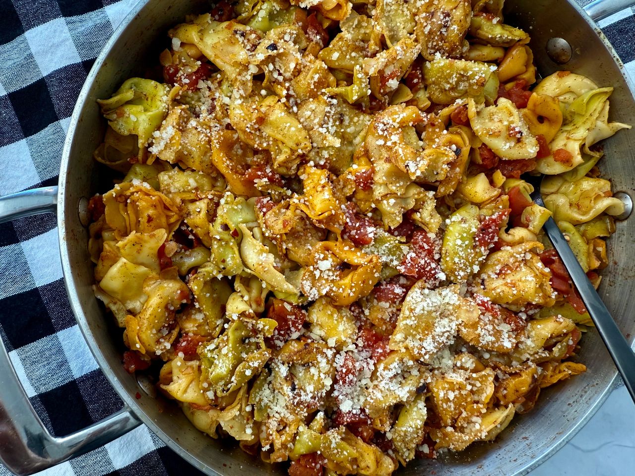 spicy tortellini in a skillet