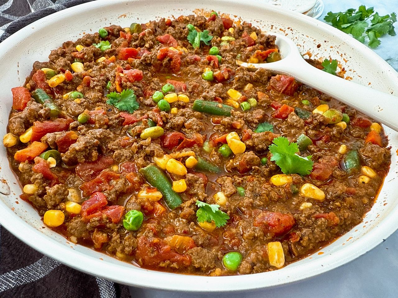 ground beef and vegetables in a skillet