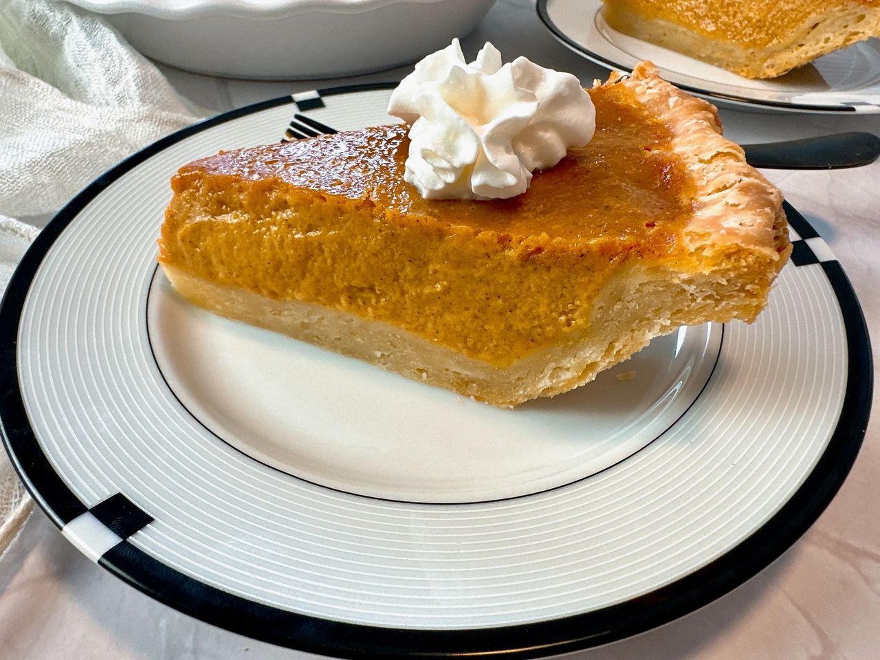 slice of pumpkin pie on a plate