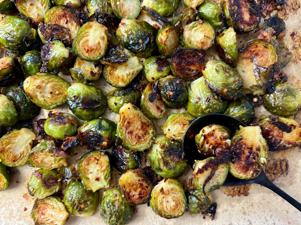 roasted brussels sprouts on parchment paper
