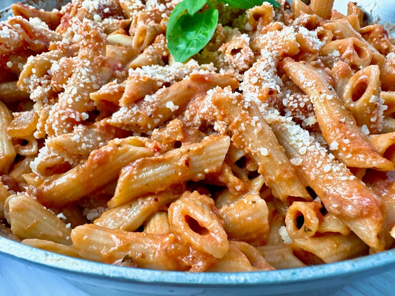 pasta in tomato cream sauce in a bowl