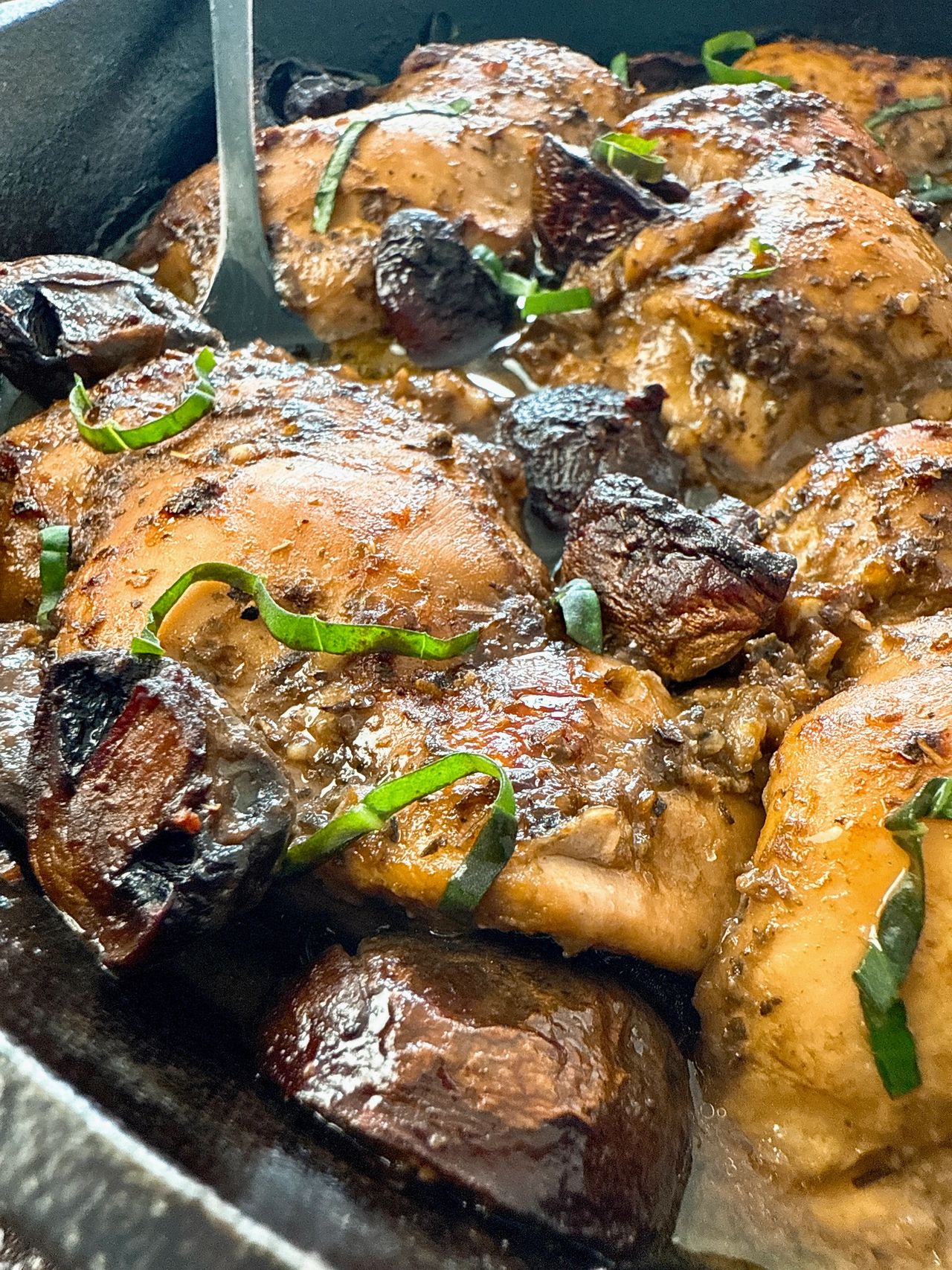 balsamic chicken and mushrooms in a cast iron skillet