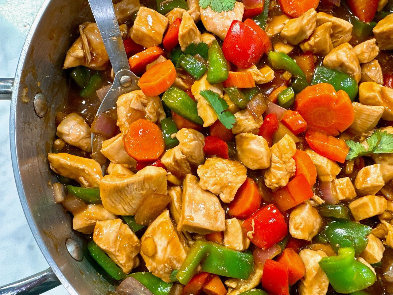 chicken stir fry in a skillet