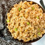 mango rice in a brown bowl