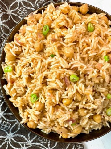mango rice in a brown bowl