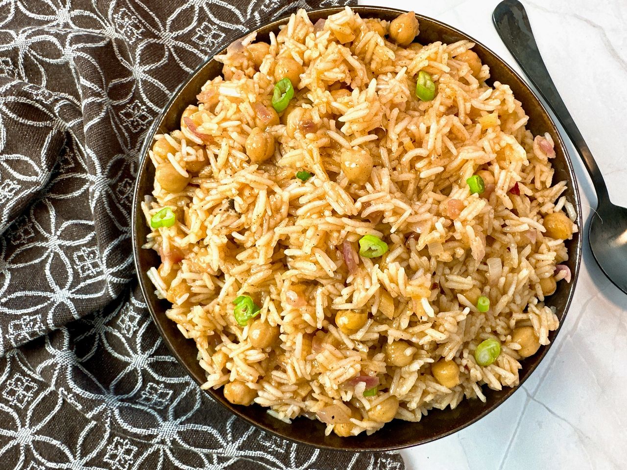 mango rice in a brown bowl