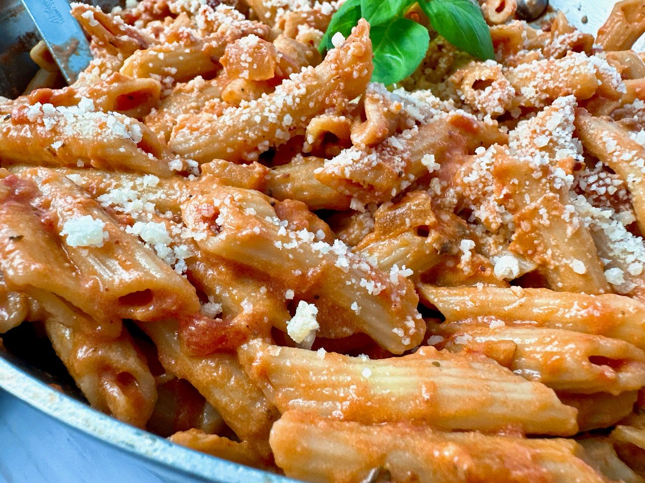 pasta in tomato cream sauce in a bowl