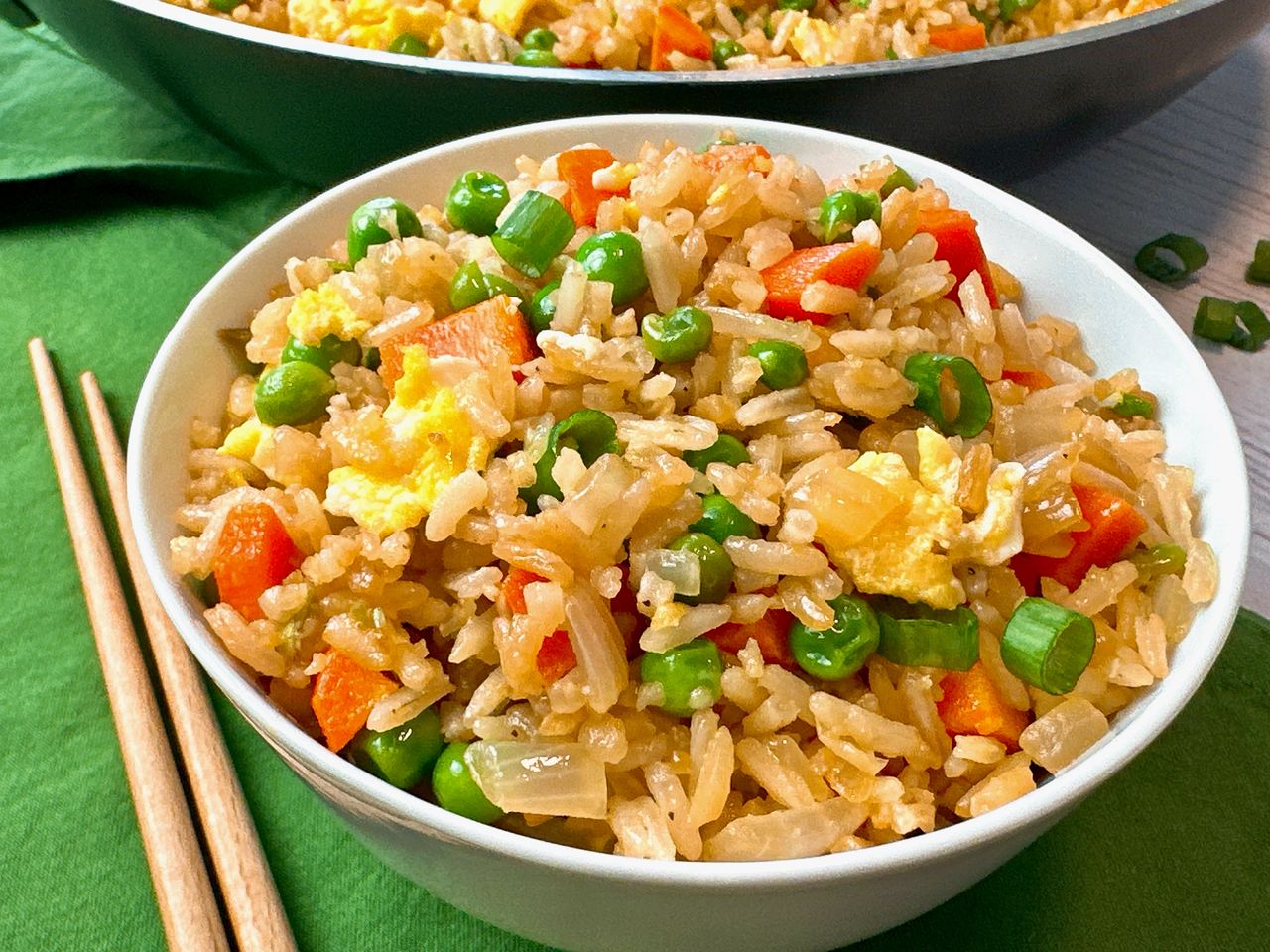 Fried rice in a bowl with chopsticks