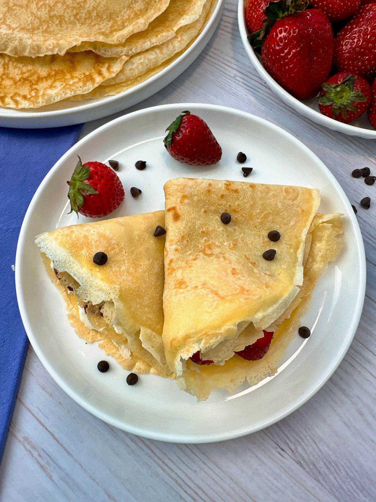 Crepes filled with mascarpone cheese and served with strawberries