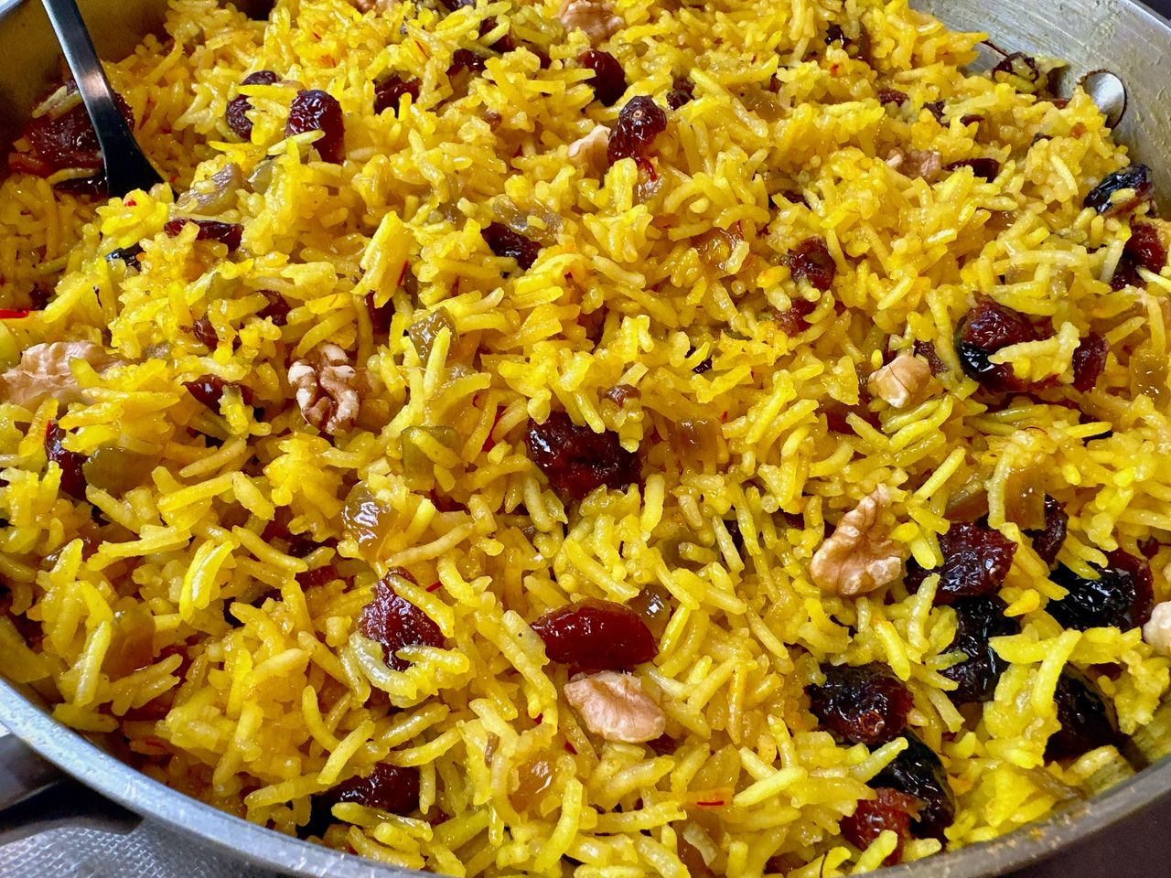 rice pilaf with cranberries in a skillet