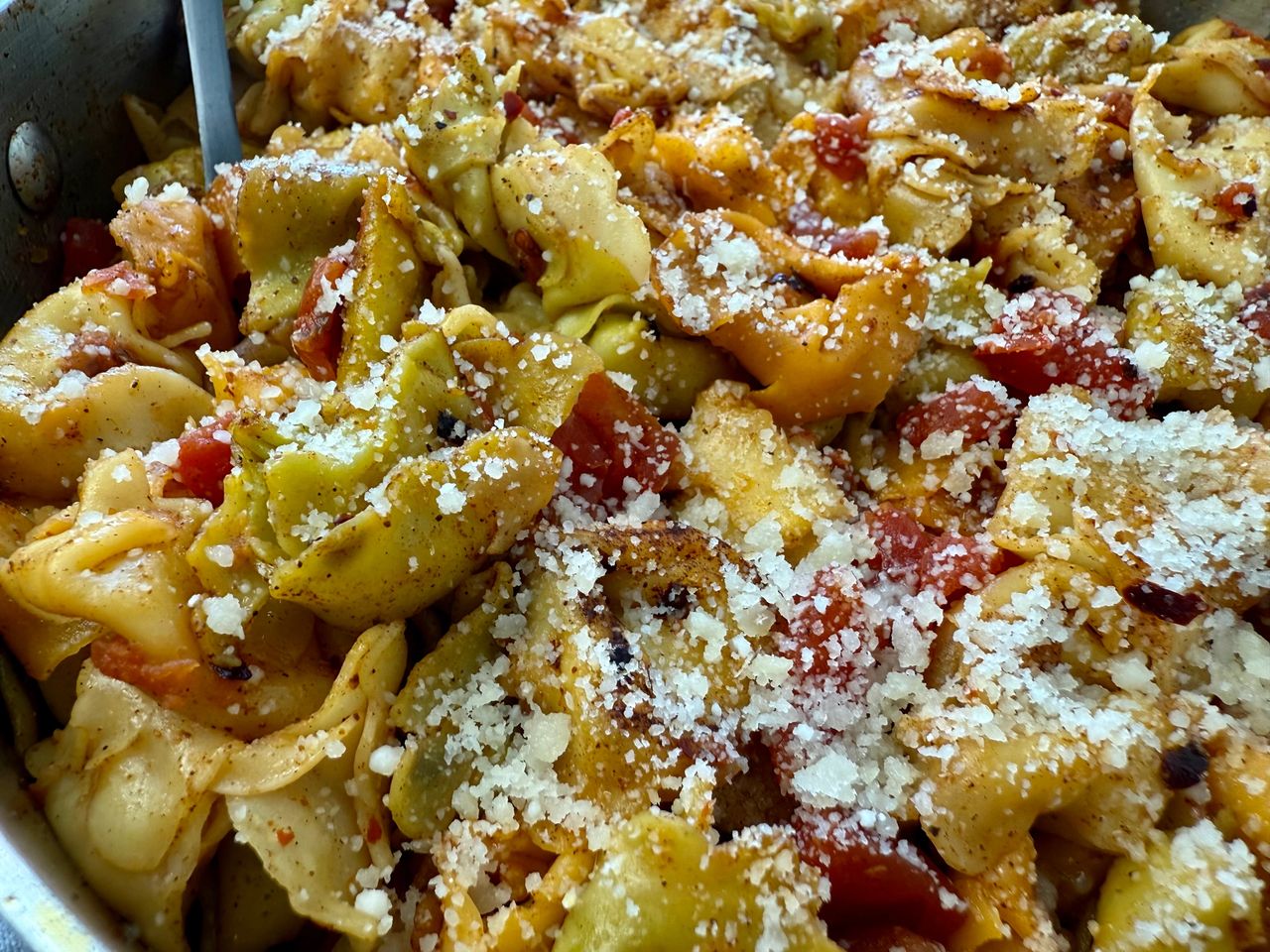 spicy tortellini in a skillet