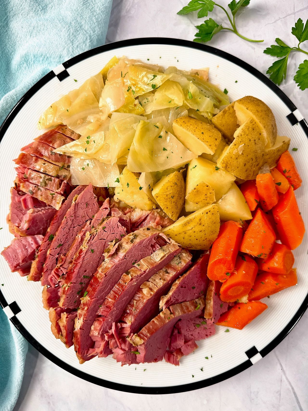 Corned Beef and Cabbage on a white serving platter