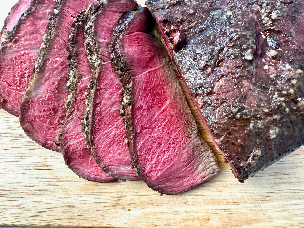 sirloin tip roast on a cutting board
