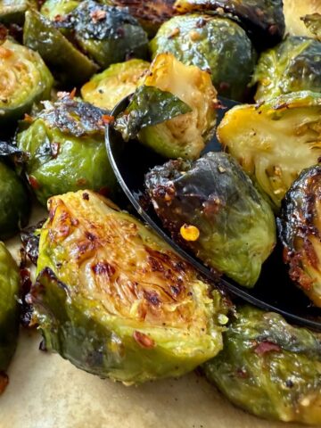 roasted brussels sprouts on parchment paper