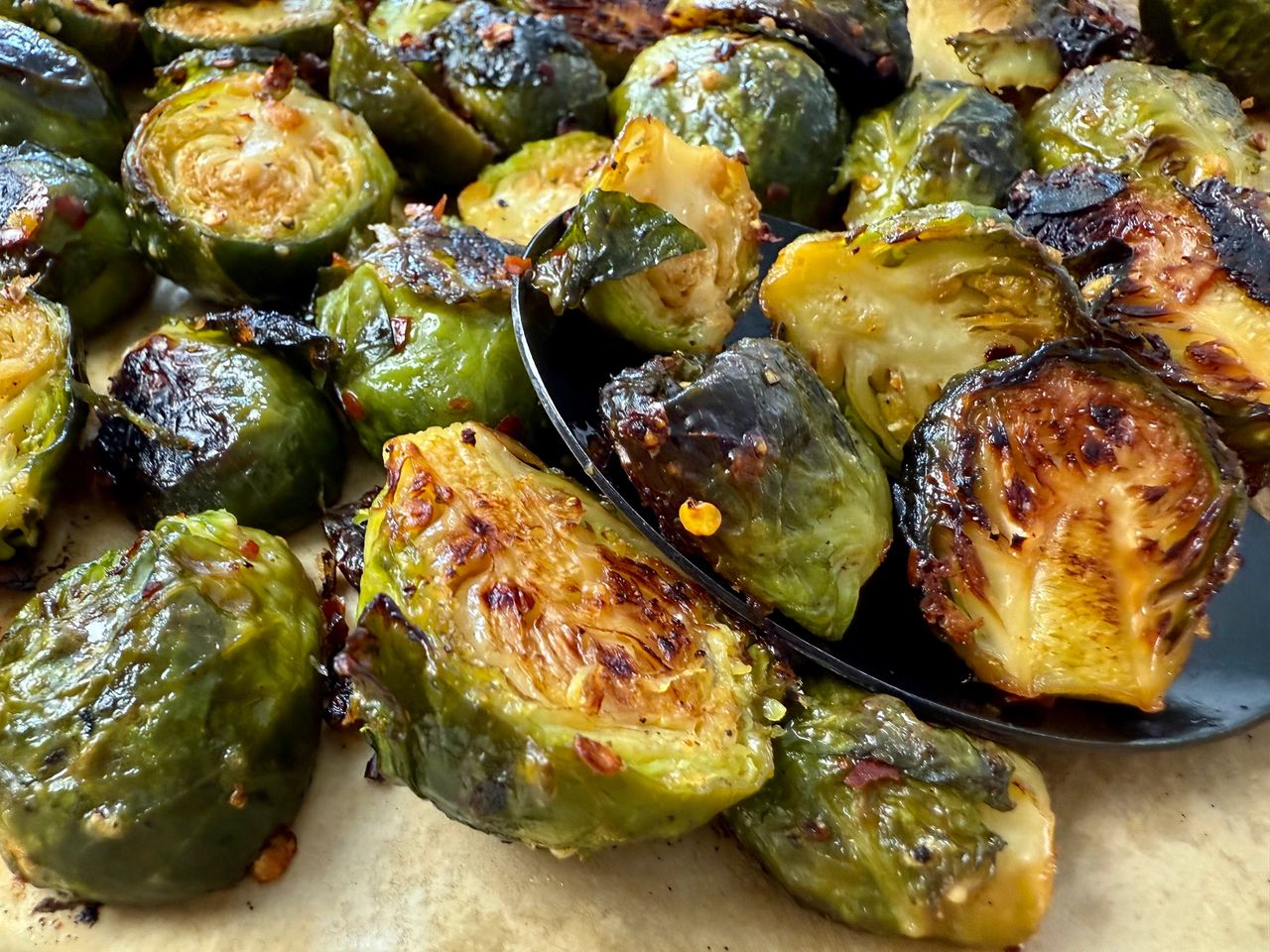roasted brussels sprouts on parchment paper