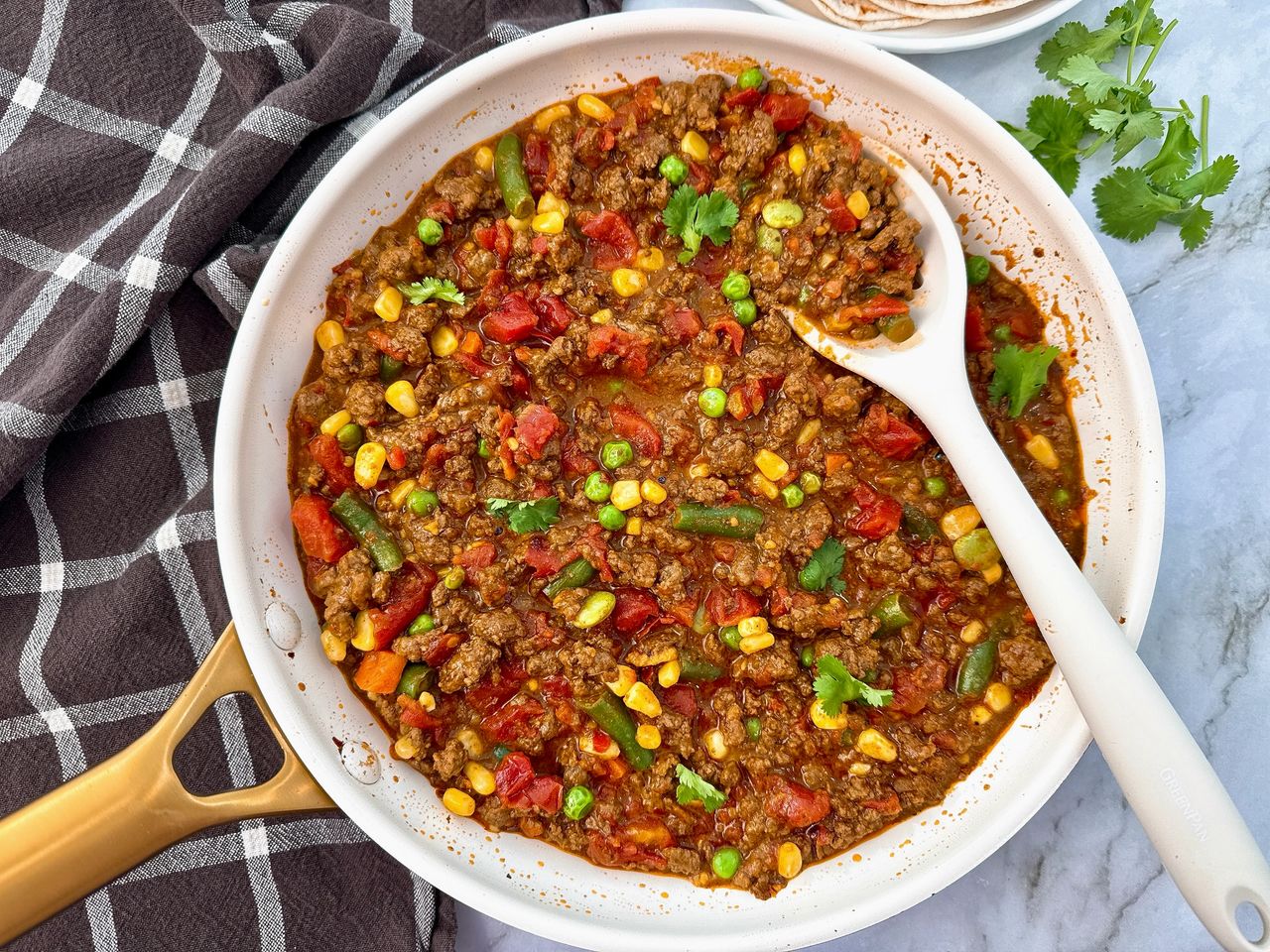 ground beef and vegetables in a skillet