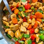 chicken stir fry in a skillet