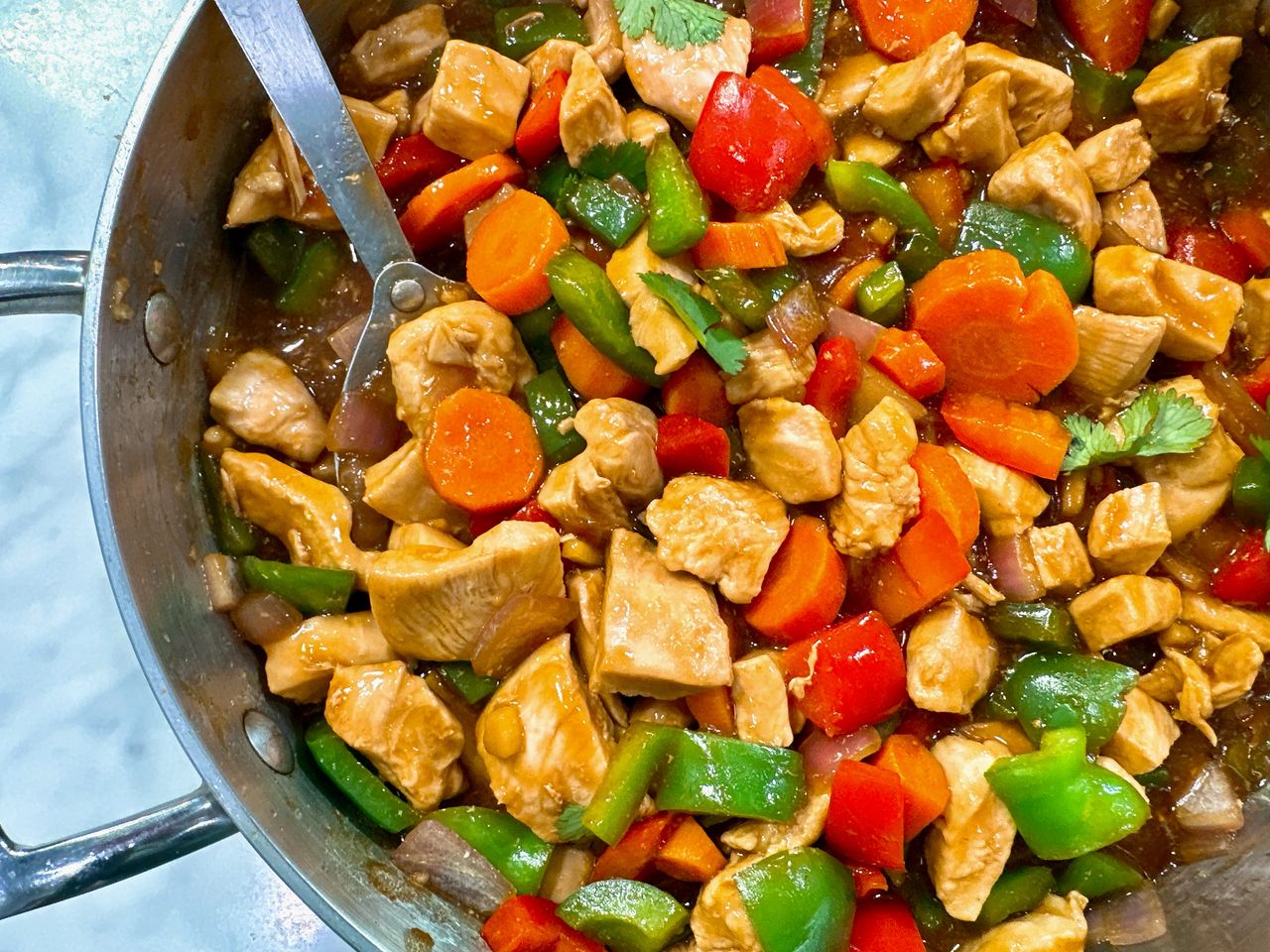 chicken stir fry in a skillet