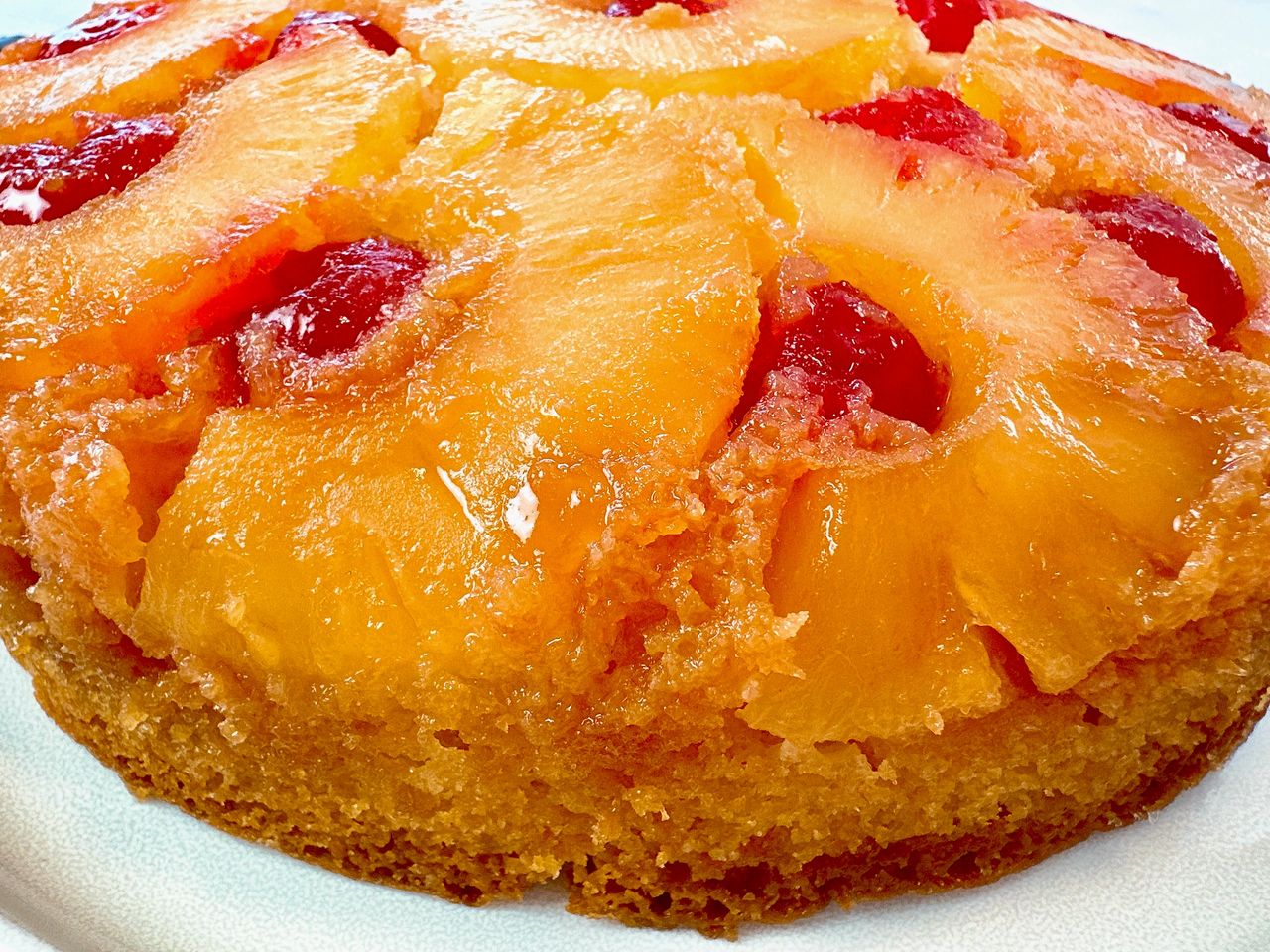 pineapple upside cake on a white plate