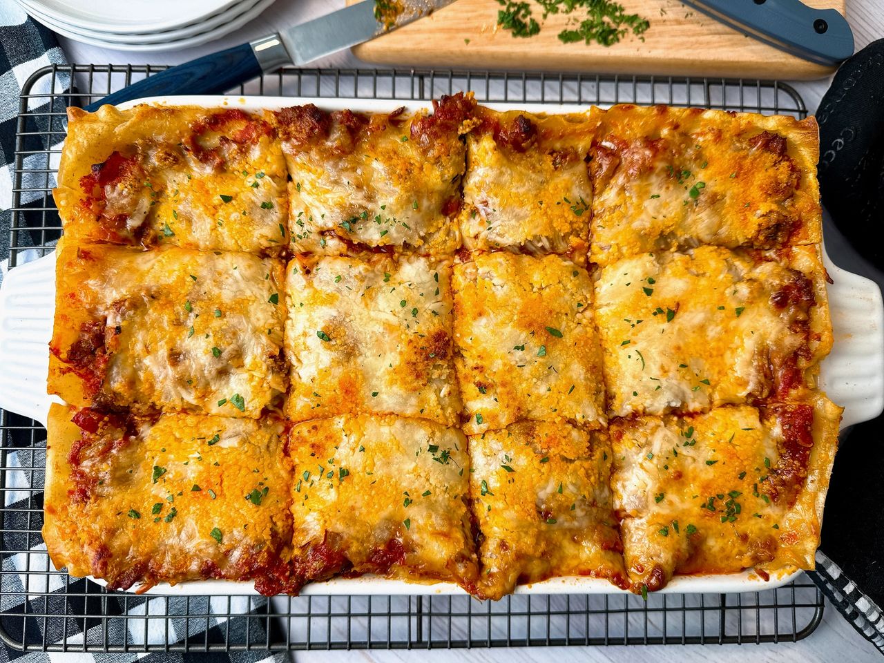 lasagna in a white baking dish