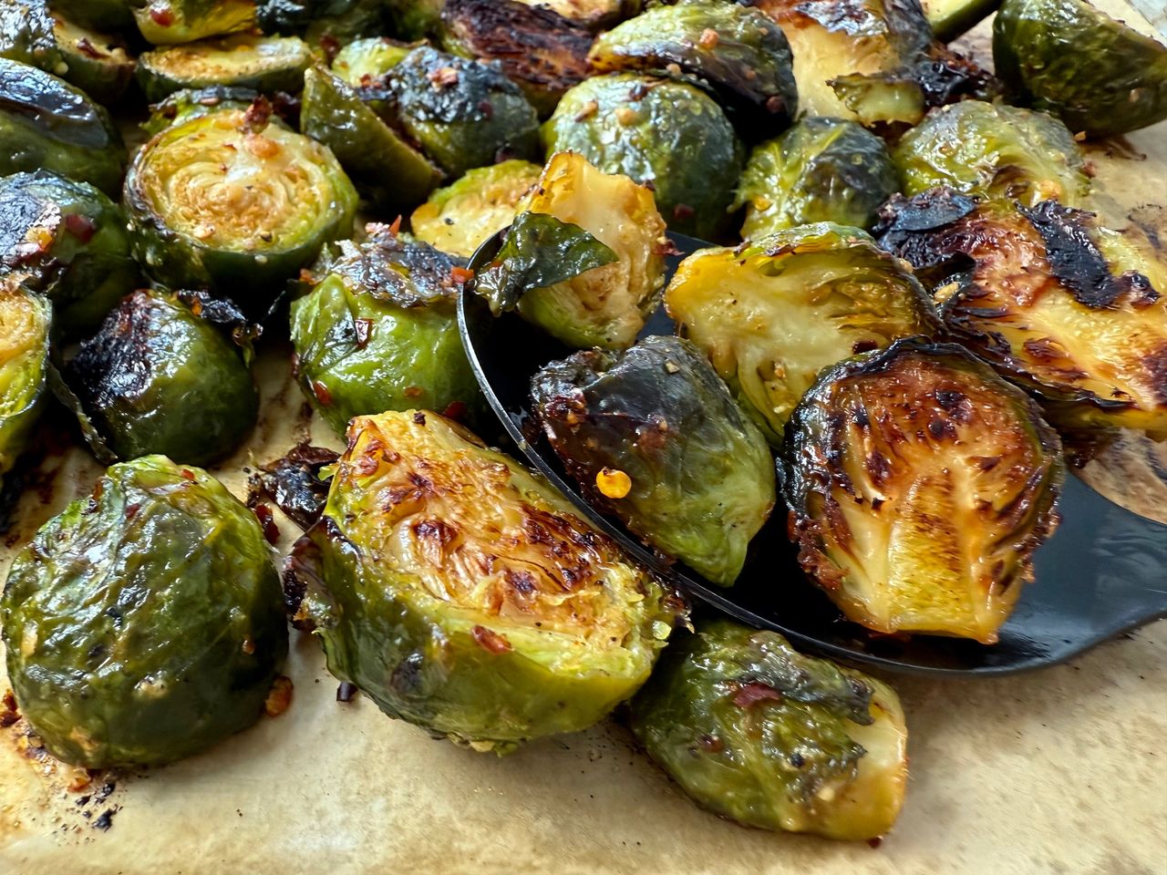 roasted brussels sprouts on parchment paper