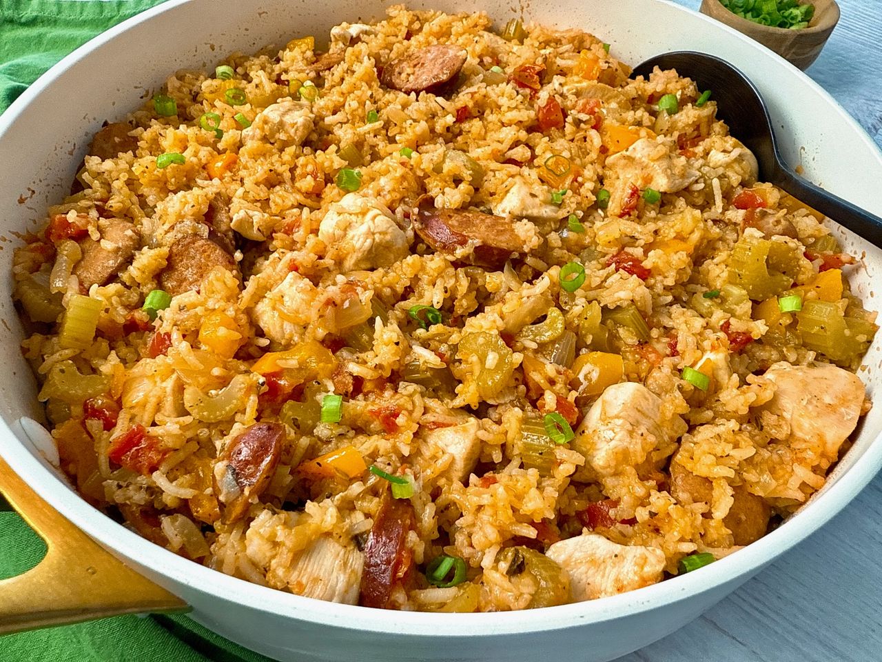 jambalaya in a white sauce pan
