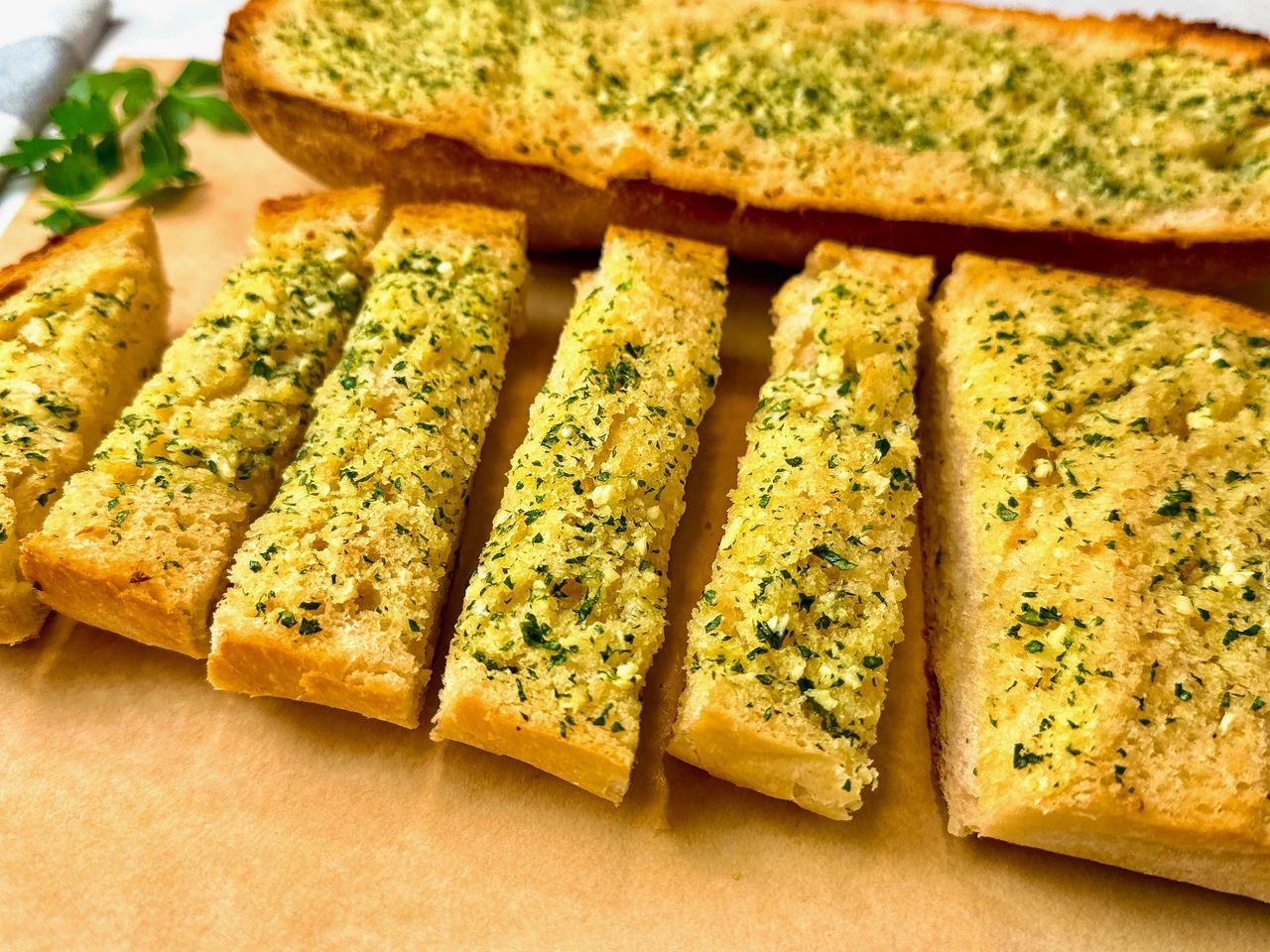 garlic bread on parchment paper