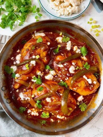 taco chicken and peppers in a skillet