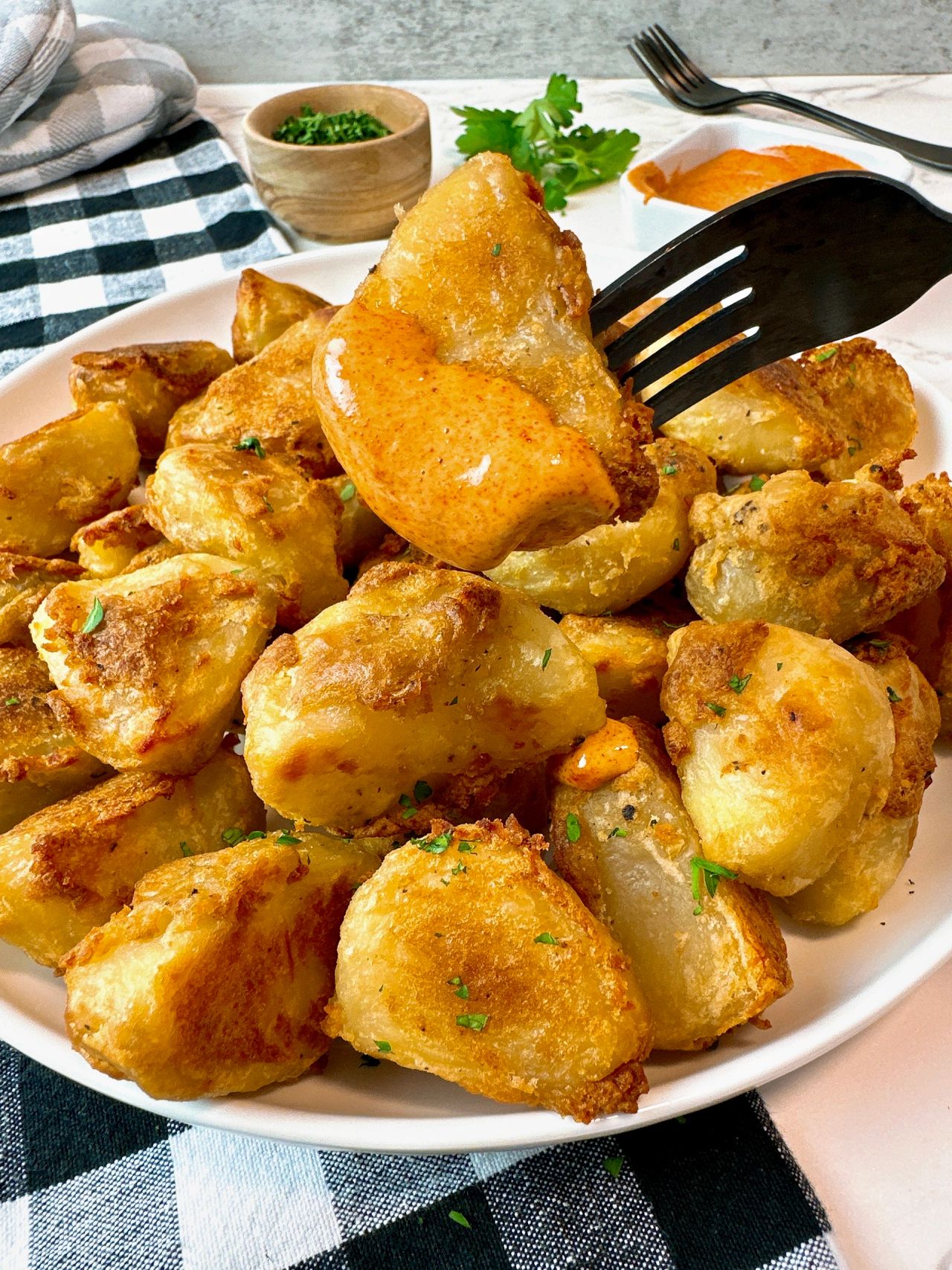 crispy roasted potatoes with sauce