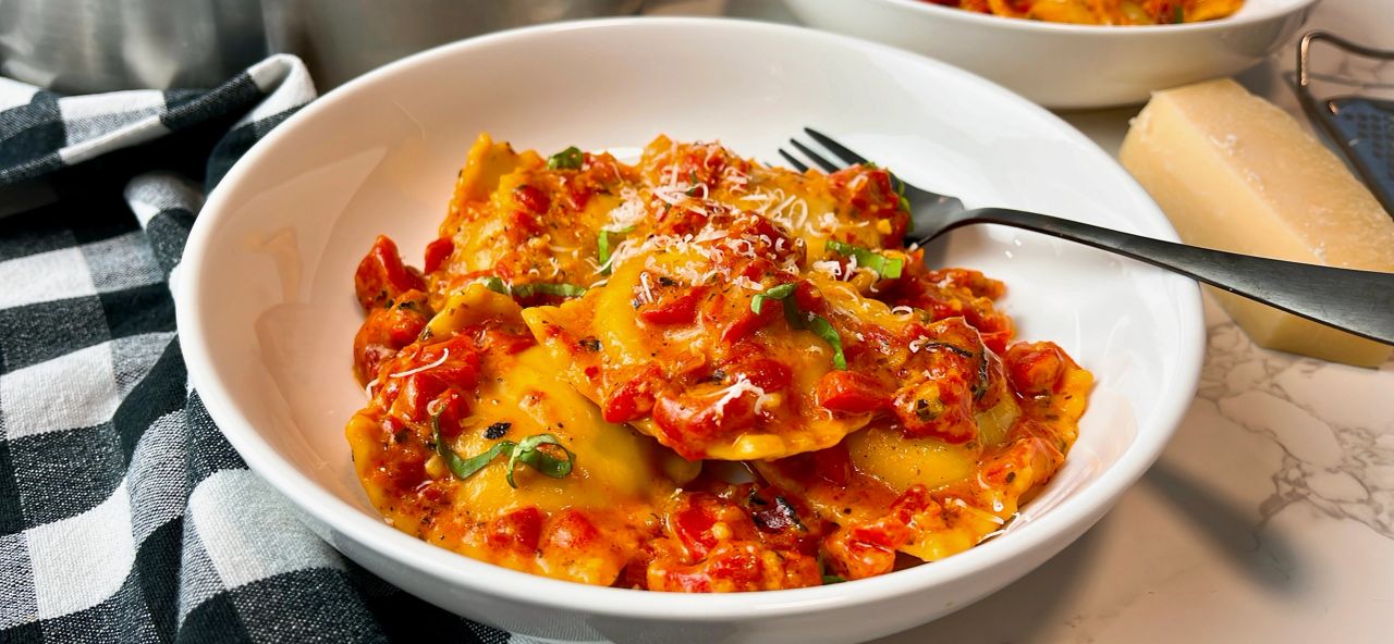 ravioli with red pepper sauce