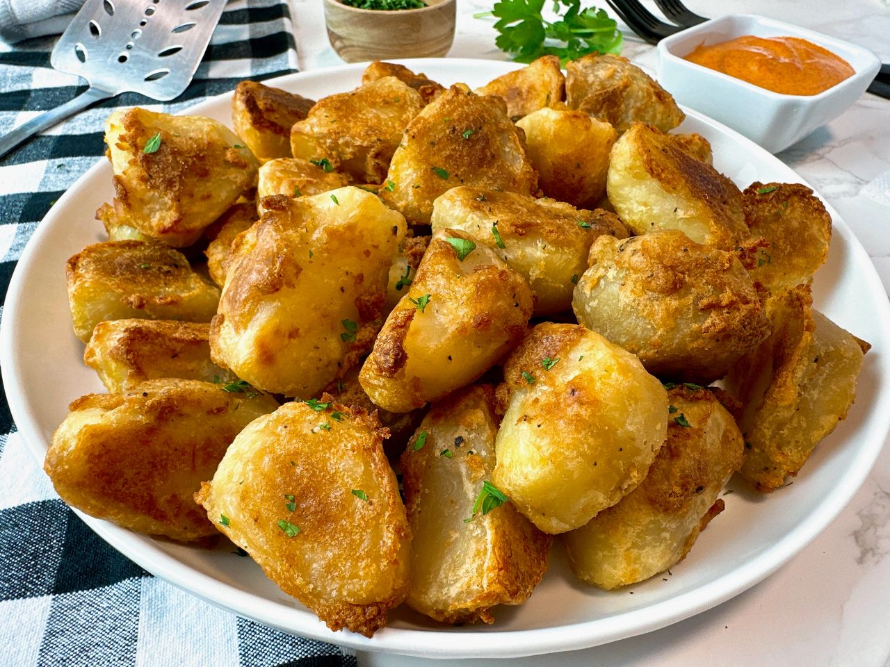 crispy roasted potatoes with sauce