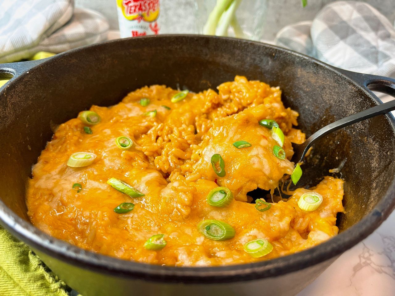 rice with taco seasoning and Mexican cheese