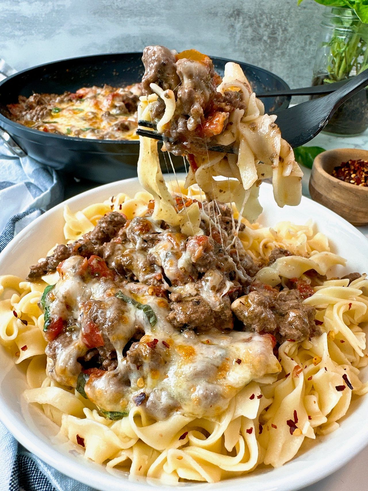 cheesy pesto beef and noodles